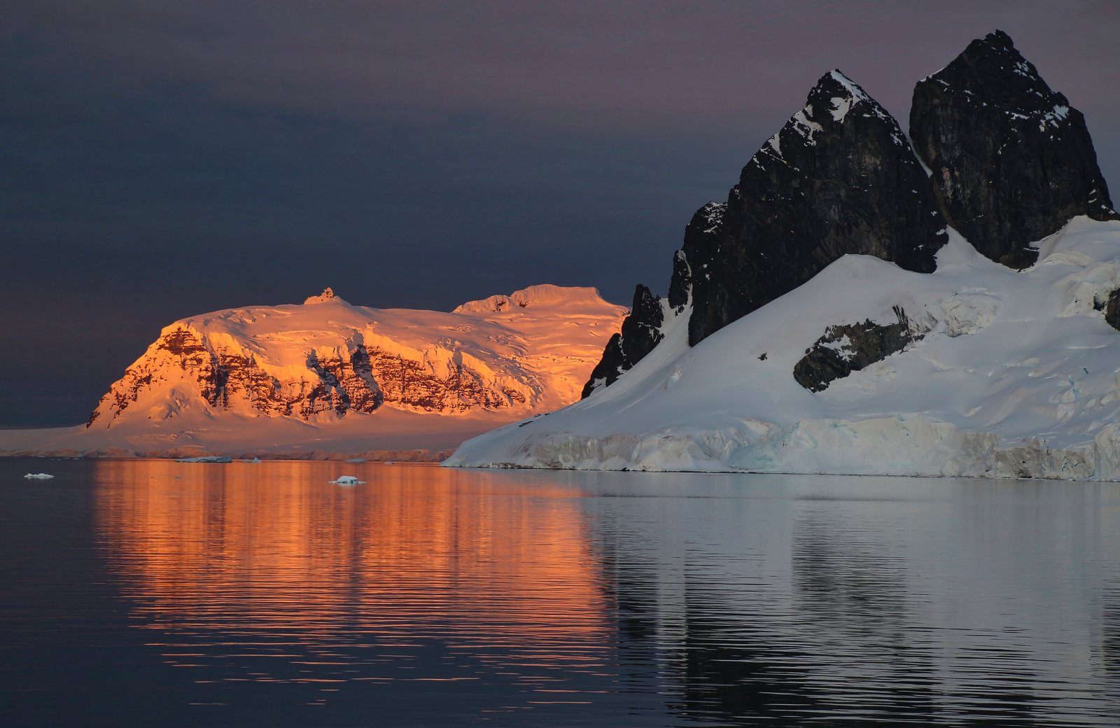 Sunset over jagged peaks, Antarctic Peninsula